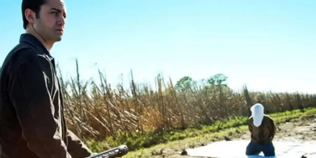 A tense scene from the sci-fi film Looper