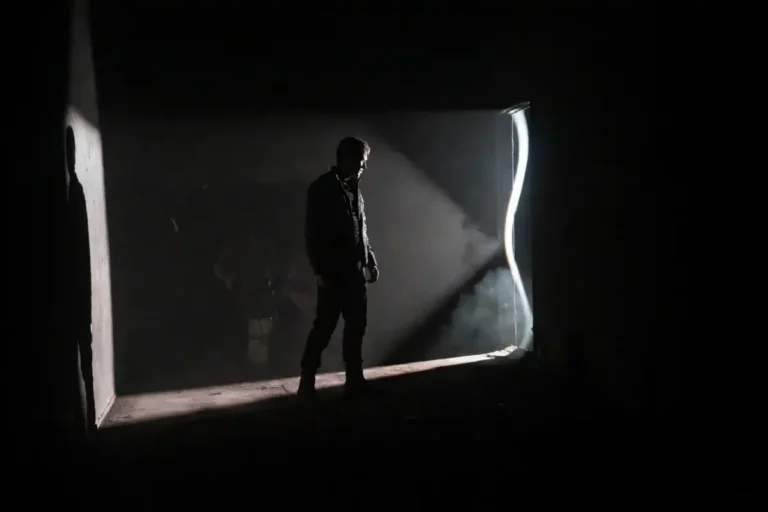 Tense action hero scene representing films with surprising twist endings