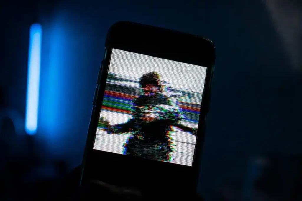 Smartphone displaying an unverified leaked photo linked to Alpha fake news claims