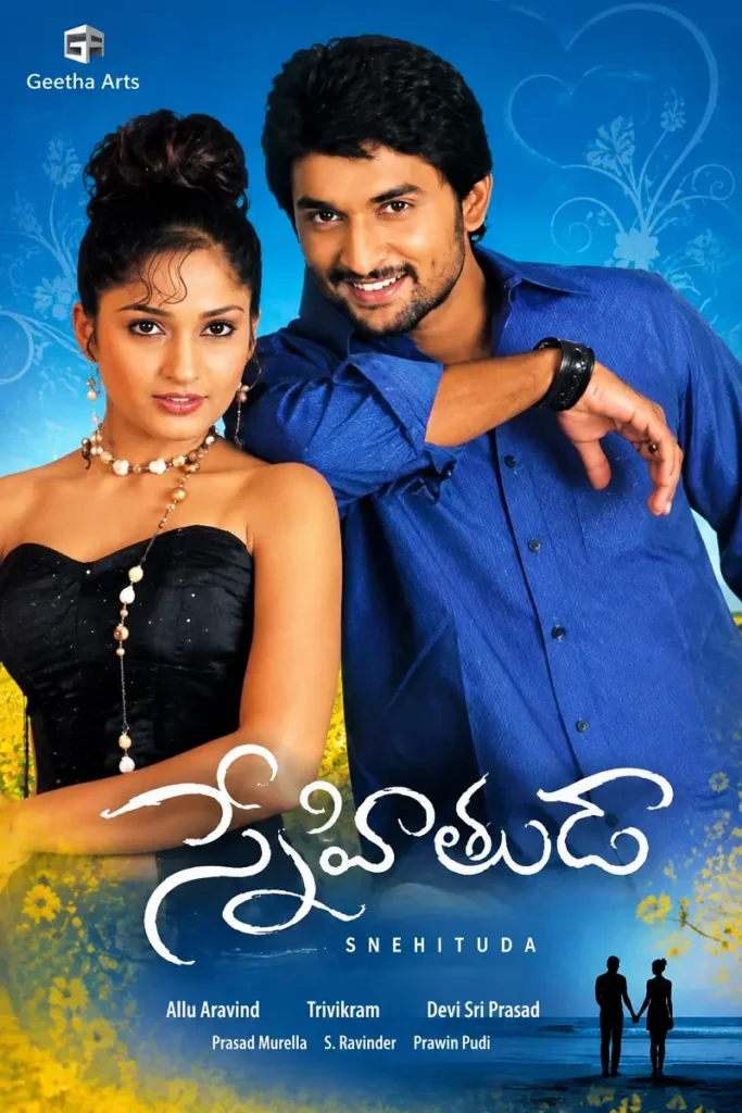 Snehituda (2009) Telugu movie poster featuring a smiling couple against a vibrant blue background with yellow flowers